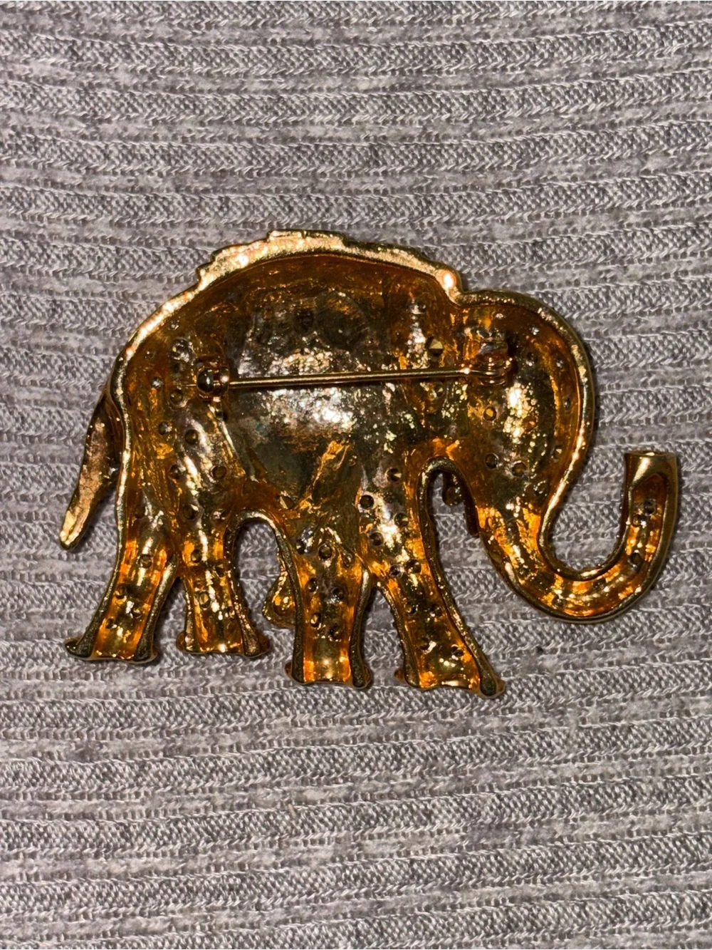 Vintage gold tone clear rhinestone encrusted elephant brooch w green rhinestone